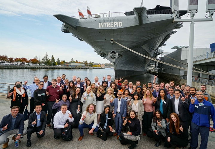 executive mba students outside of intrepid ship