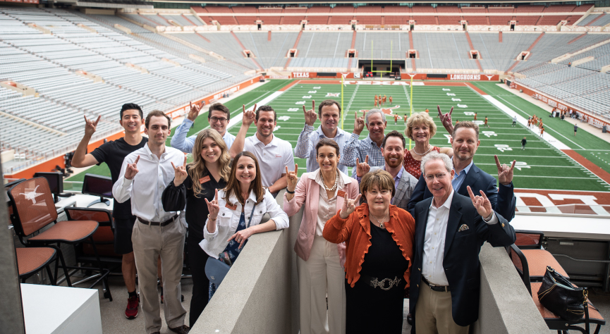 CLE Advisory Council, staff, and students at UT football stadium