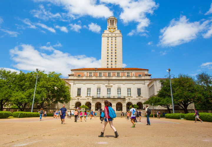 Students walking in front of University of Texas tower