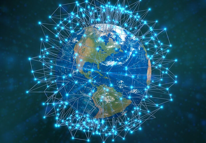 Stock art showing globe with lights indicating network connections