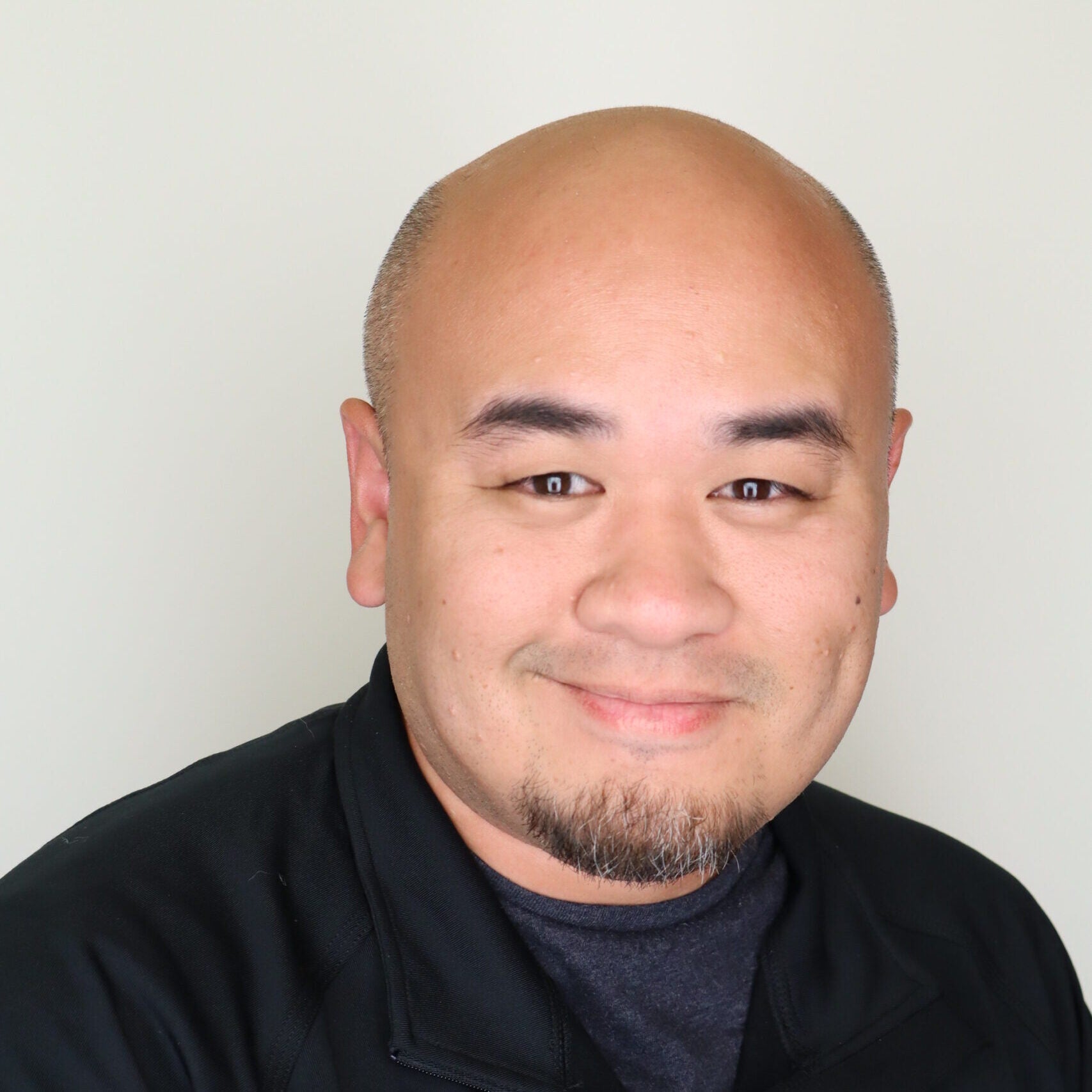 Headshot photo of James Co-Enriquez