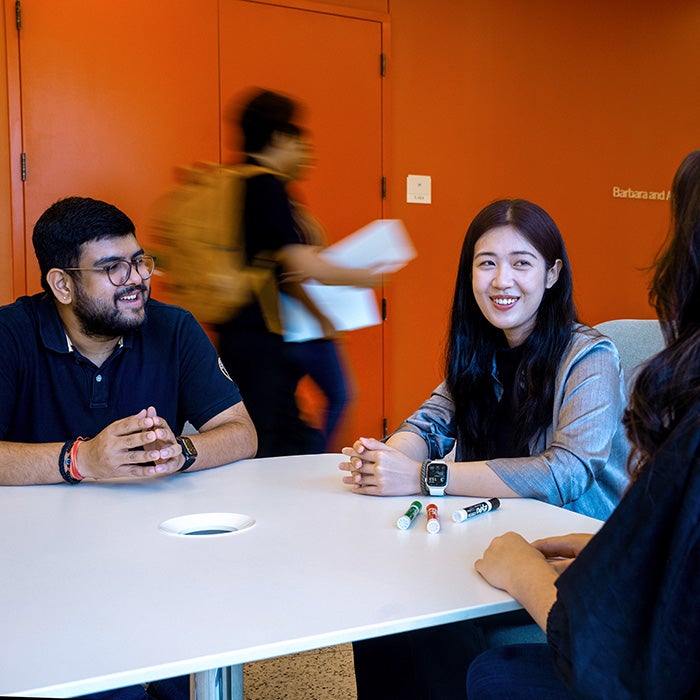 McCombs students at a table