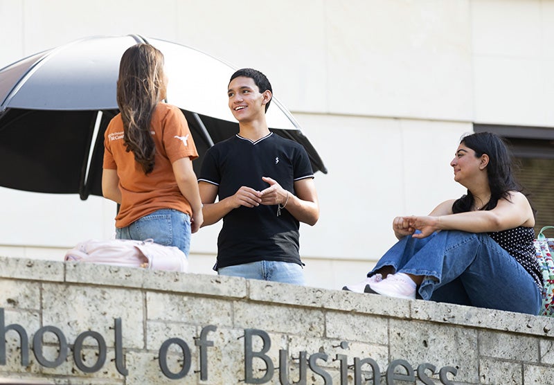 Students outside of the McCombs School of Business