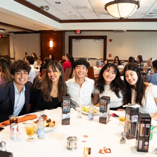 McCombs Summer Institute students attend the end of program ceremony at the UT Club on July 27, 2023.