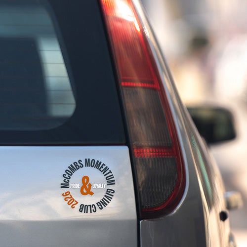 Back of car with McCombs Momentum Club decal